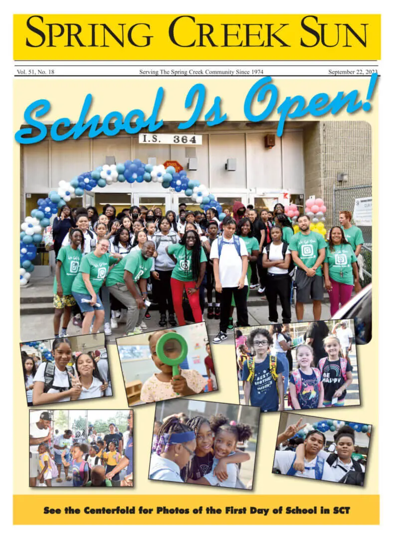 A joyful group celebrates their school's reopening with balloons and photos.