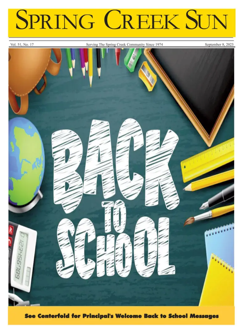 Back to School text surrounded by school supplies and a globe.